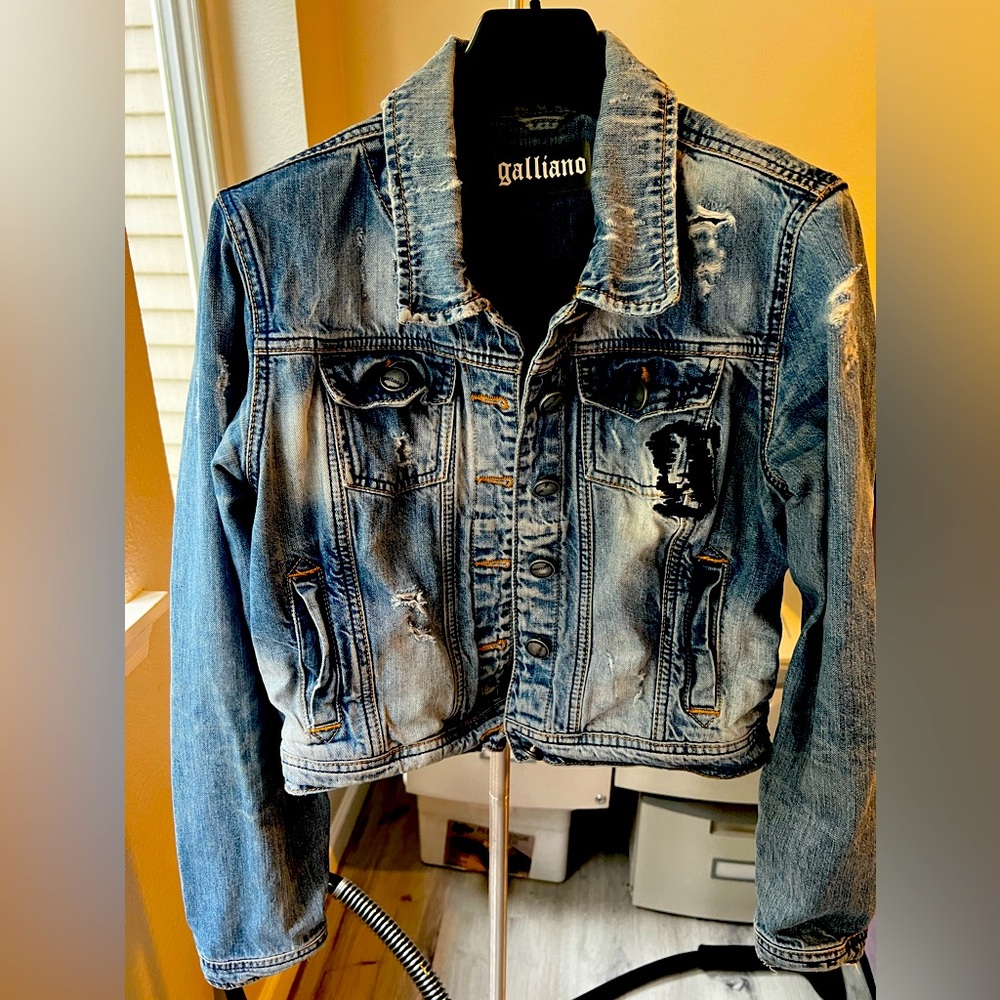 Distressed denim jacket . Size M